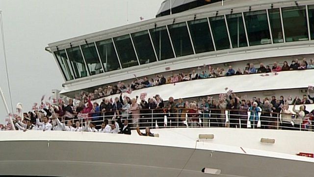 Passengers waving from ships's deck