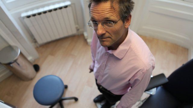 Michael Mosley checks his weight
