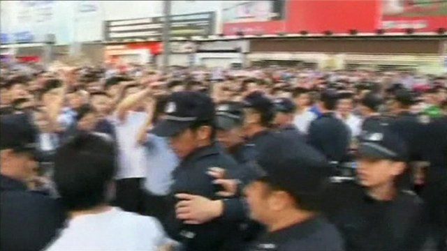 Police trying to hold back protests