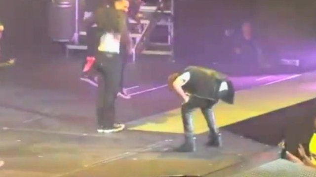 Justin Bieber being sick on stage