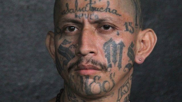 An MS gang member with a tattooed face