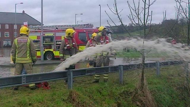 Fire crews pumping water in Ruthin