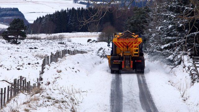 Gritter on road