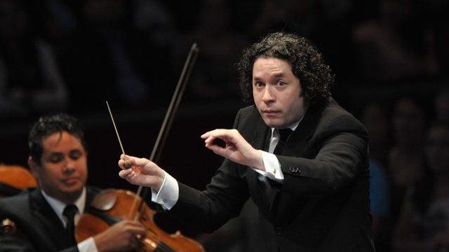 The Venezuelan conductor Gustavo Dudamel (C), his wife, the