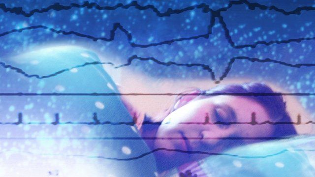 Computer artwork of EEG (electroencephalogram) traces superimposed over a sleeping woman.