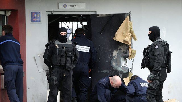 Police investigators outside Sequedin prison on the outskirts of Lille