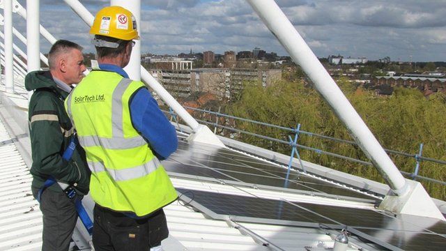 Solar panels being installed on roof of Northampton Saints' ground