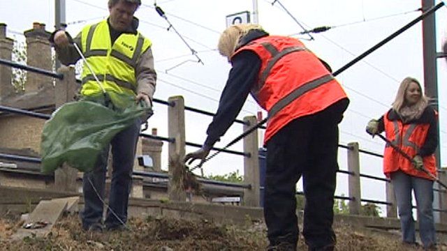 Clear-up work at Shepreth Station where poppies are being planted