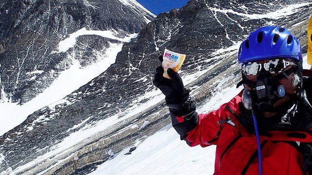 80 year-old Japanese adventurer Yuichiro Miura poses on Mount Everest