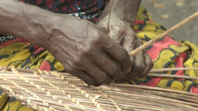Woman's hands weaving