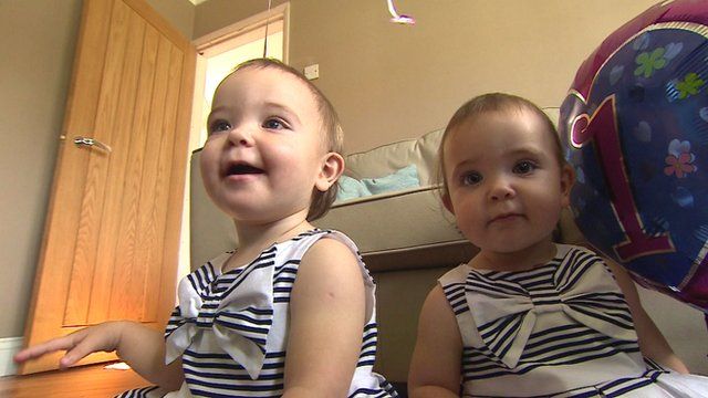 Twins conjoined at birth prepare to start school - BBC News