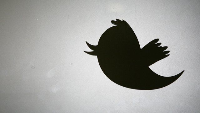 Twitter logo in silhouette