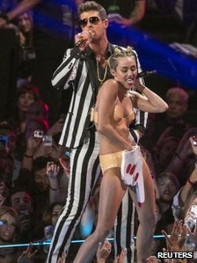 Disney Porn Miley Cyrus - Miley Cyrus MTV performance draws complaints - BBC News