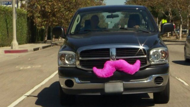 Car with a pink moustache on the front