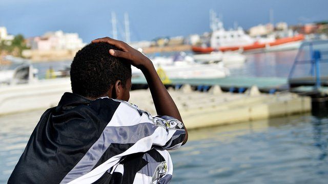 African migrant on Lampedusa after shipwreck, 8 Oct 13