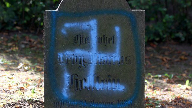 Swastika daubed on Jewish tombstone, Kroepelin, Germany 4 Sep 12