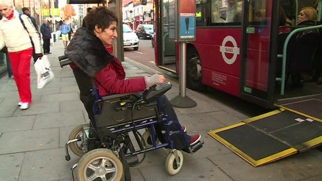 Fatemah Hossenpoor boarding a bus in a wheelchair