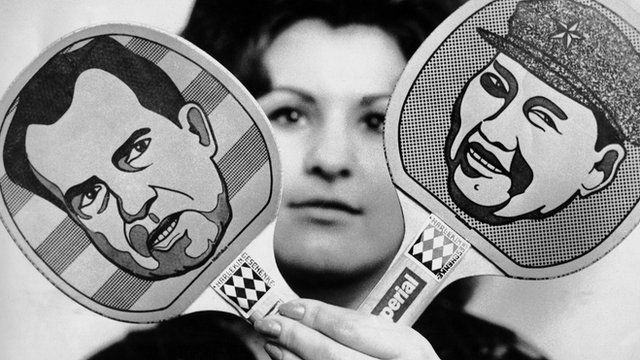 Faces of Nixon and Mao on ping pong paddles