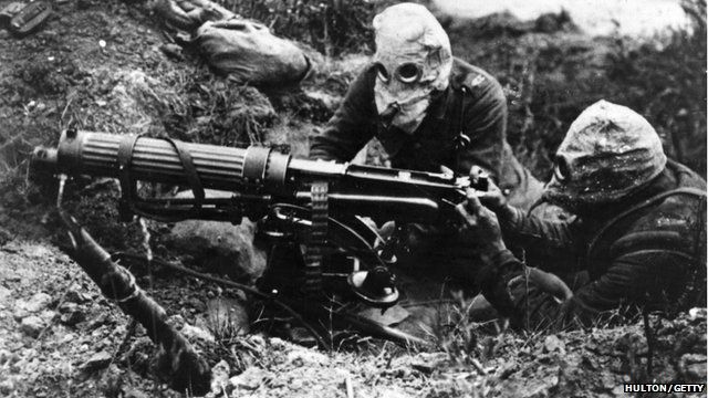 Machine gunners at the Battle of the Somme in 1916 wearing a later form of gas mask