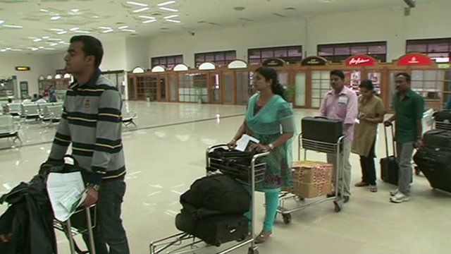 Indians in airport queue