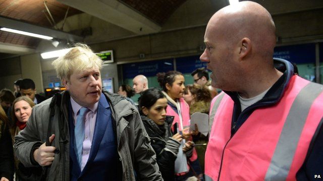 London Mayor Boris Johnson with staff at London Bridge