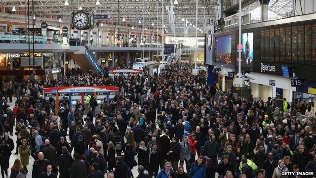 Commuters wait for trains at Waterloo