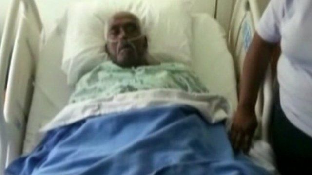 Walter Williams in hospital bed