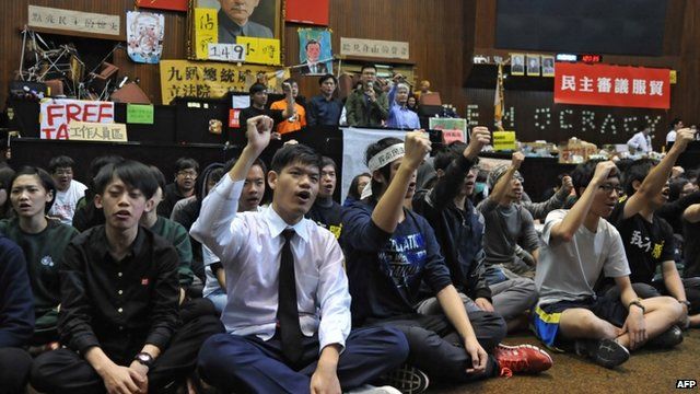 Taiwanese students occupying parliament's main chamber