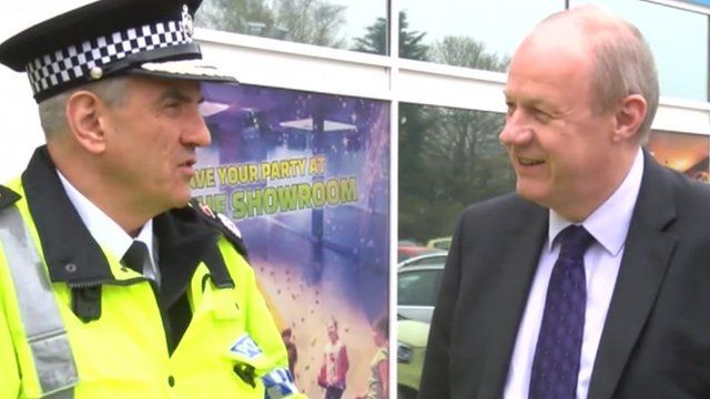 Lincolnshire's Chief Constable Neil Rhodes (left) Policing Minister Damien Green (right)