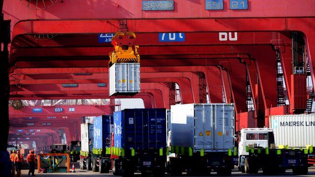 Containers being transported in Qingdao, China, March 2014