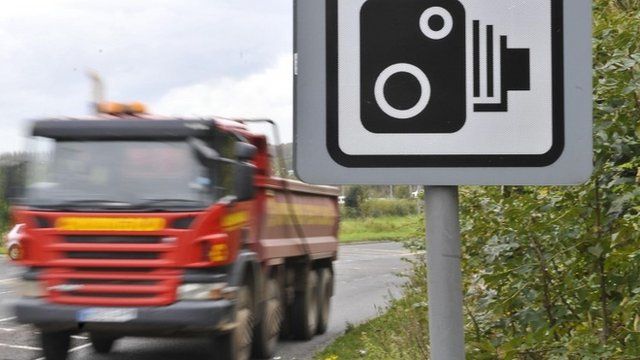 Lorry passes speed camera sign