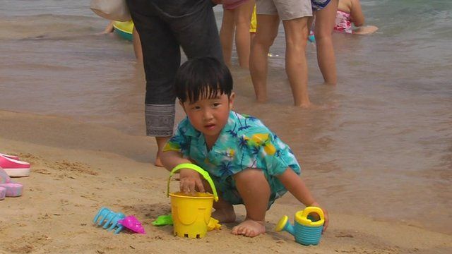 A little boy on a beach