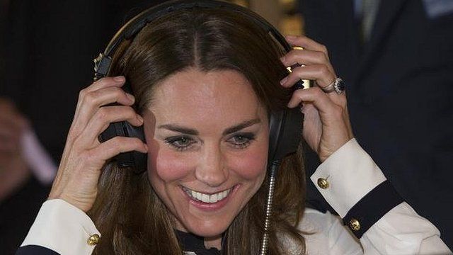 Duchess listens to headphones