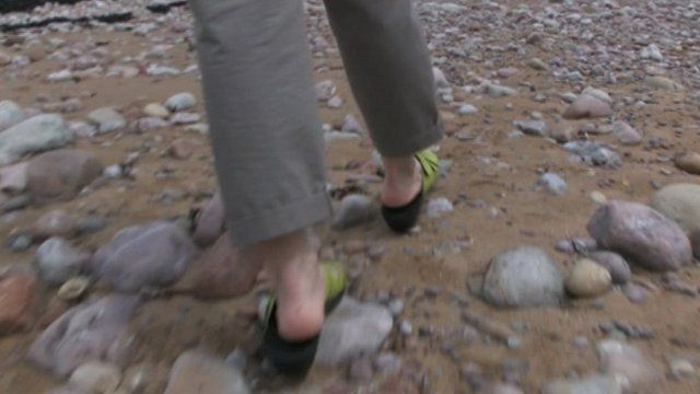 Walking on a Welsh beach