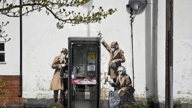 The Banksy mural "Spy Booth"