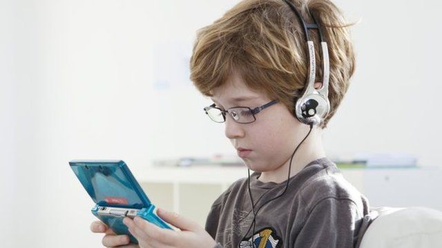 Picture of a child playing video games