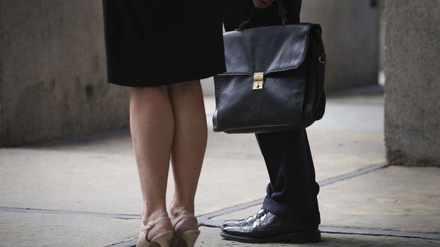 Women and man with briefcase