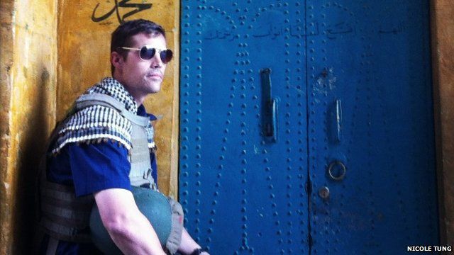 James Foley sitting in a doorway in Syria