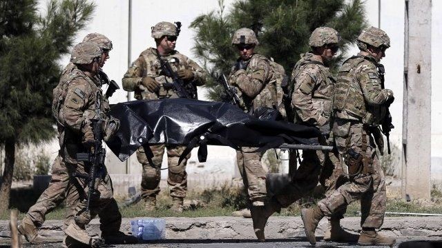Taliban fighters kill 18 Afghan soldiers, beheading eight - BBC News