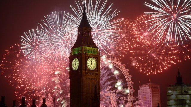 Fireworks explode over London on 1 January 2014