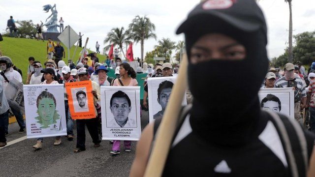 Students, peasants and other people demonstrate against the suspected massacre of 43 missing Mexican students, in the proximities of Acapulco's airport, in the Mexican state of Guerrero State, on November 10, 2014