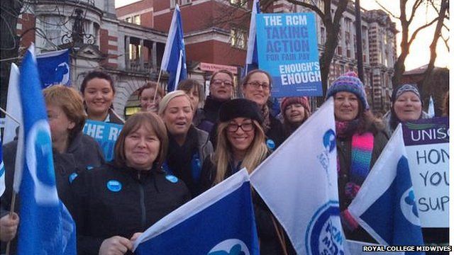 Midwives striking in central Manchester