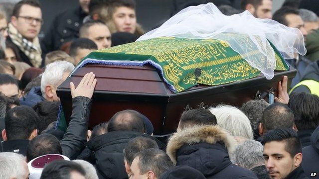 Tugce Albayrak's coffin is carried through crowds of mourners