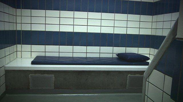 Bed in police cell