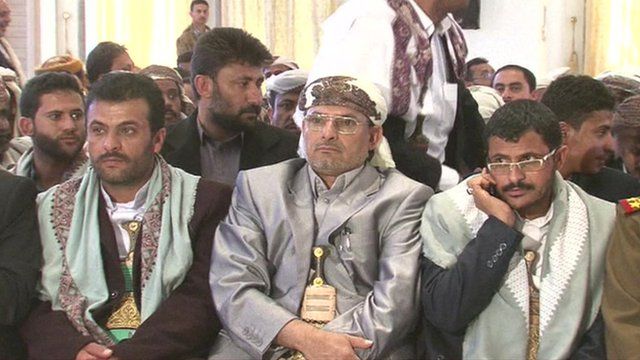 Houthi men in the Presidential palace