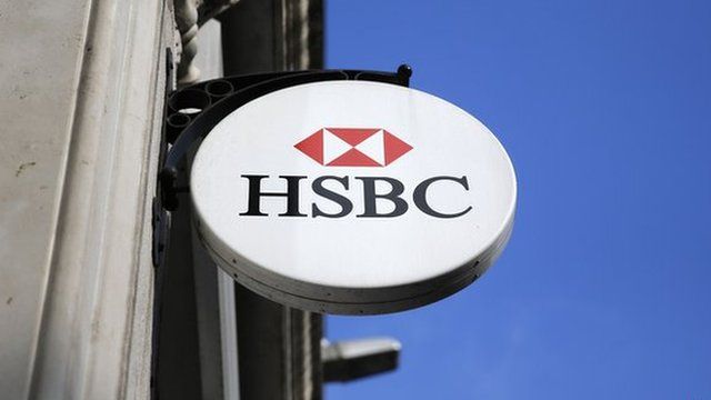 HSBC sign is seen outside a bank branch in London