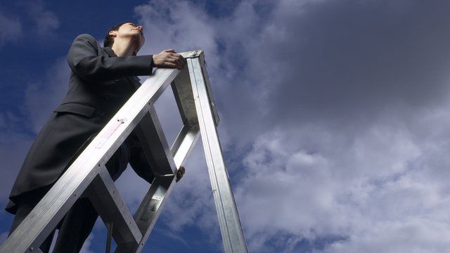woman on ladder