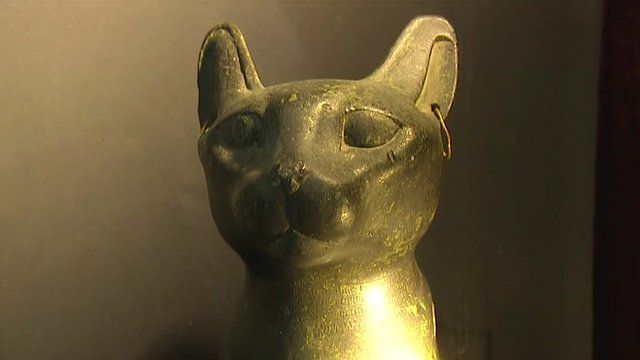 Ancient Egyptian bronze cat bust