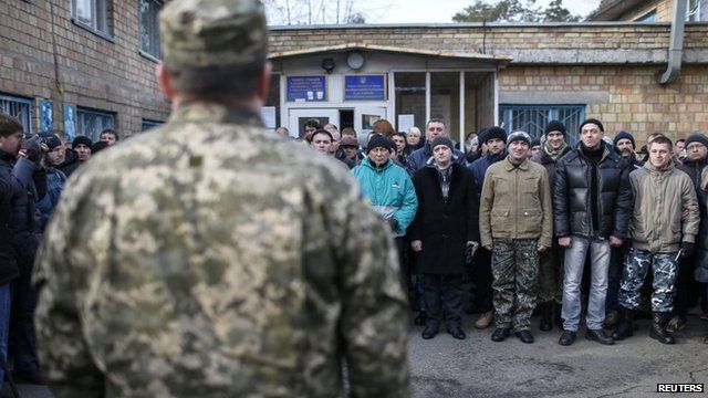 Conscripts attend a ceremony marking their enrolment in the Ukrainian army in Kiev on 29 January 2015