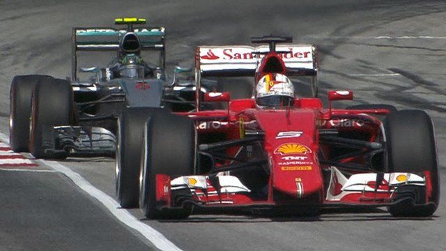 Vettel passes Rosberg & takes race lead
